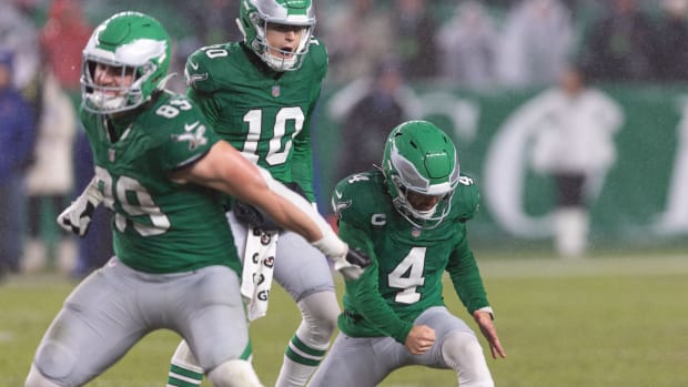 Philadelphia Eagles kicker Jake Elliott (4) pumps a fist after making an improbable 59-yard field goal in the wind and rain to send the Week 12 game against the Buffalo Bills into overtime, where Philly won, 37-34